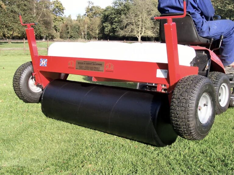 Carrier frame with roller for firming up the ground